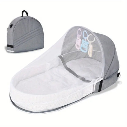 Lit de voyage pliable pour bébé avec moustiquaire - Protection et confort.